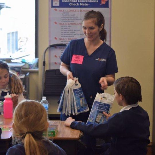 Orthodontic team member at community event