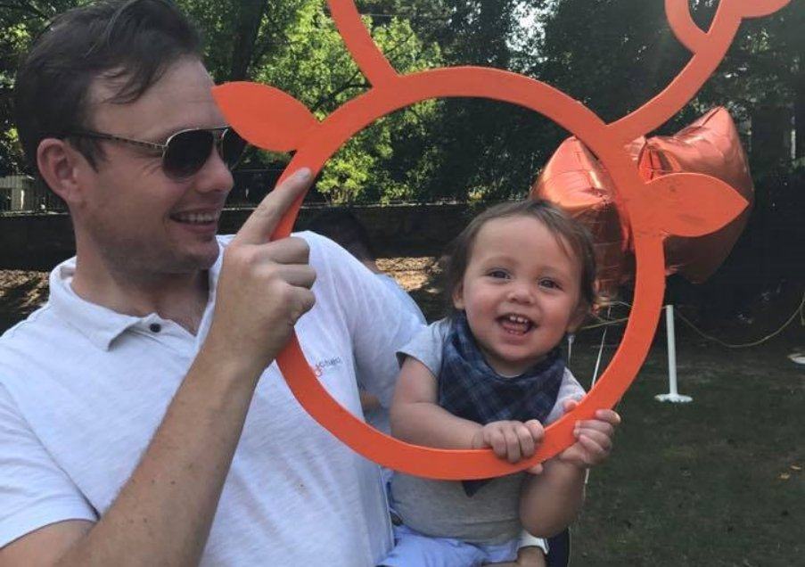 Orthodontist and child posing for picture