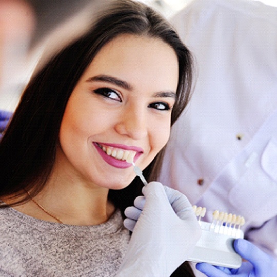 Woman smiling after Glo Science teeth whitening in Atlanta