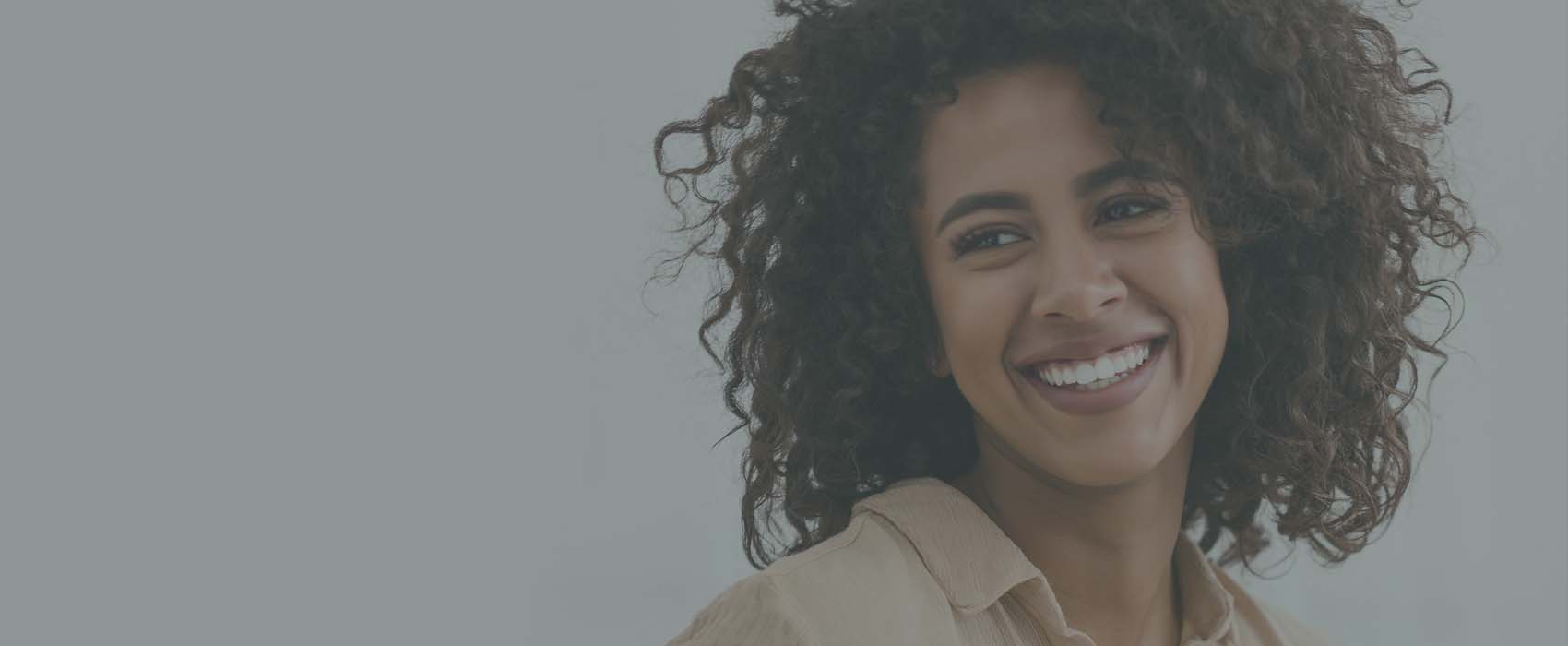 Woman smiling after treatment with orthodontics in Atlanta