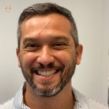 Man smiling after orthodontic office visit