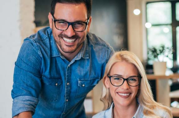 Man and woman sharing healthy smiles