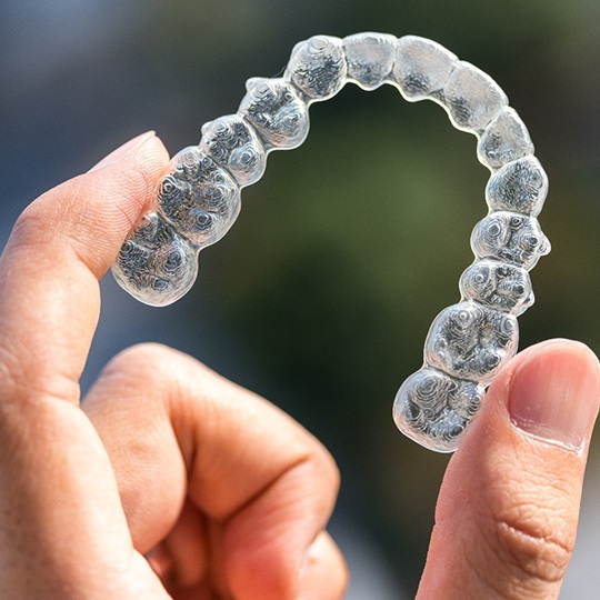 a closeup of an Invisalign tray in Atlanta