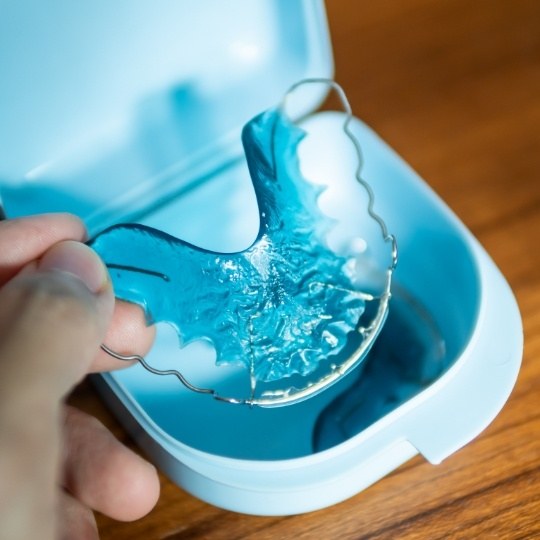Retainer in a carrying case