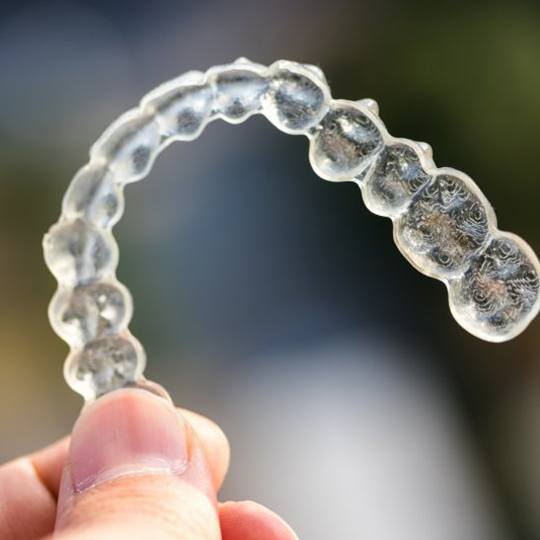 Closeup of Spark Clear Aligners in Atlanta on colorful background 