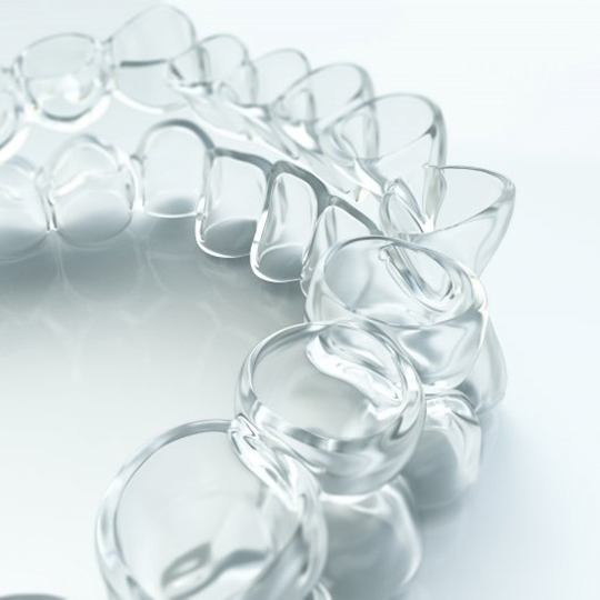 Closeup of nearly invisible Spark Clear Aligners in Atlanta 