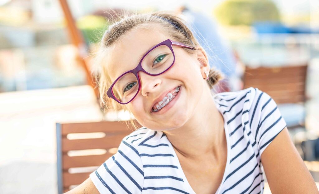 Girl smiling with braces